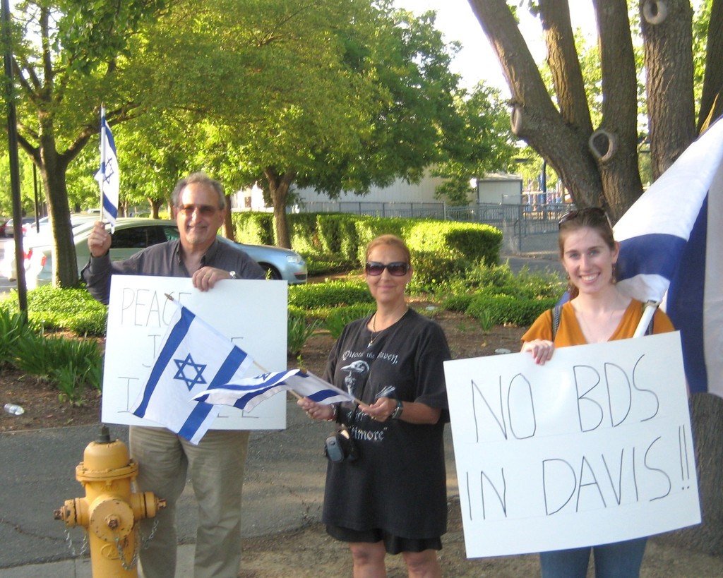 On the other side of the entry to the parking lot. We were particularly pleased to have the head of the local student chapter of Christians United for Israel--CUFI (woman in the right of the photograph) with us yesterday.