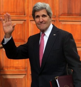 John Kerry strikes a Chamberlainesque pose.