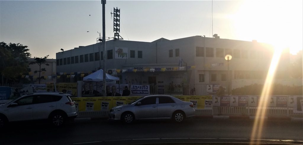 7:00 am: the sun breaks over your humble servant's voting station here in Ashdod. Note the campaign signs--we'll give you a closer look during the day.
