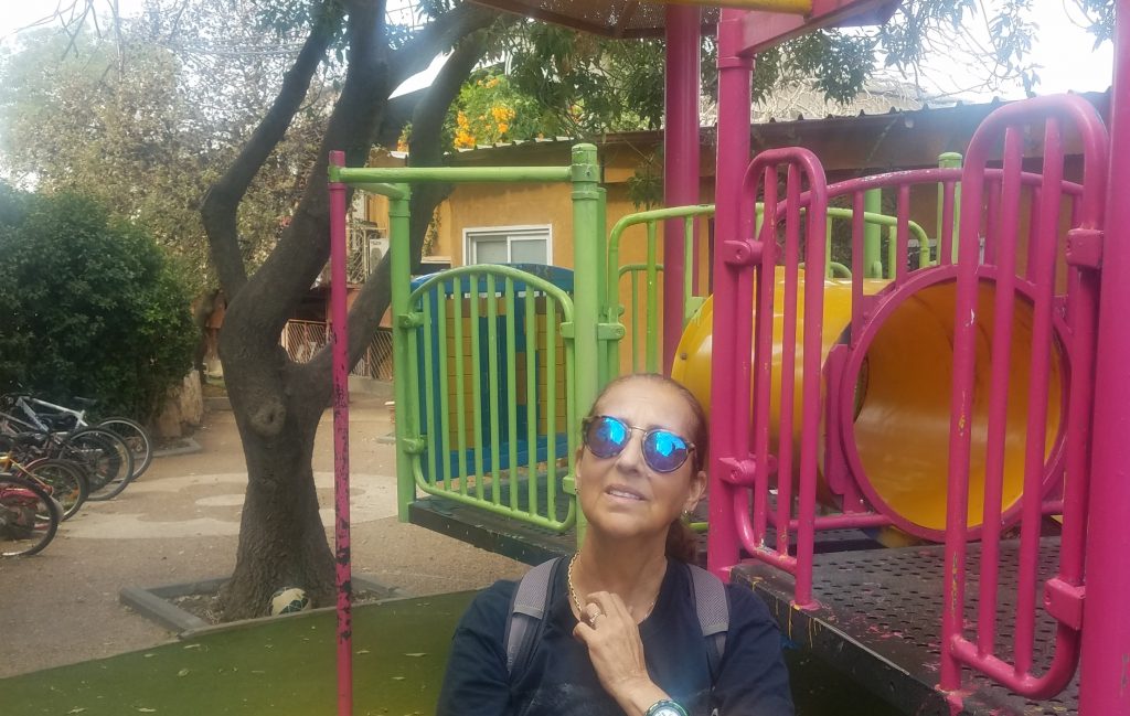 Your humble servant's wife admiring the kids' playground.