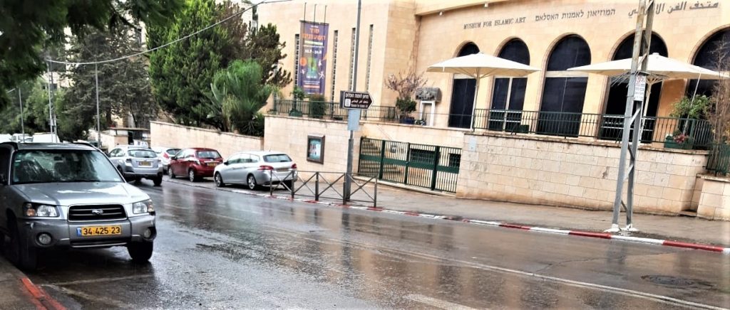 A rain-slickened street in Jerusalem yesterday afternoon (photo: Maya Horodnichano).