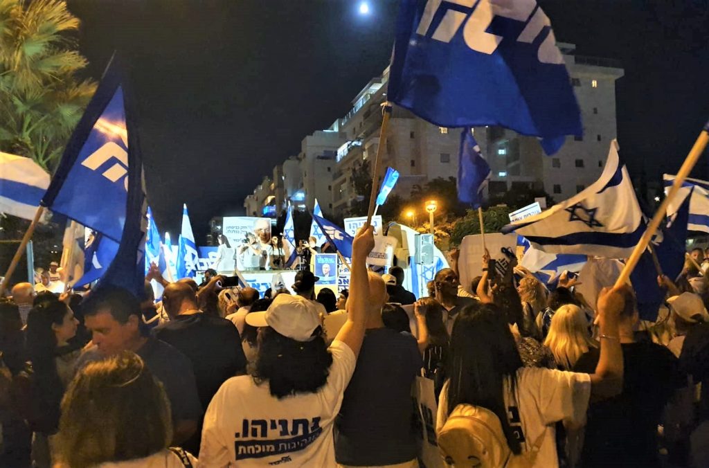 Protest and counter-protest in Petah Tikva last night.