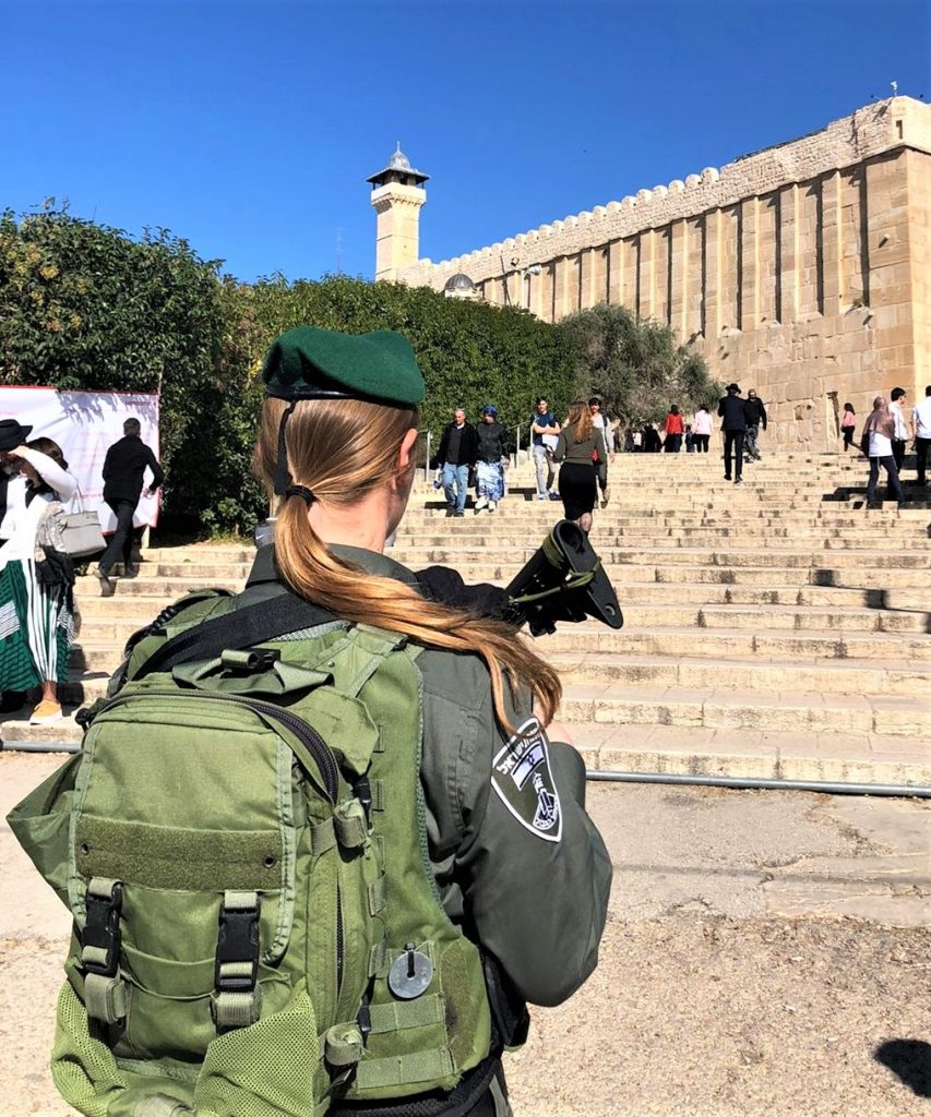 A soldier stands guard at the steps to the Machpelah in Hevron yesterday.