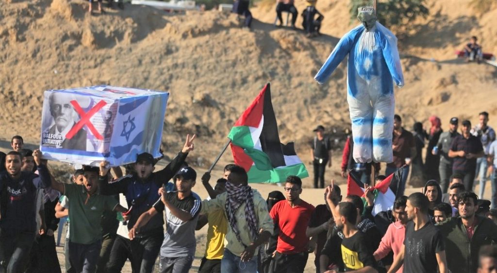 An Israeli hung in effigy, an Israeli-flagged coffin (note the X on Balfour), a PLO flag: just another day on the Gaza border.