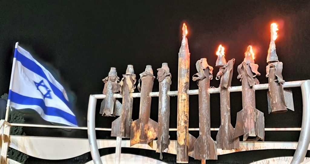 The famous chanukiyah in Sderot. The candles are Qassams that were fired at Sderot; the shamash is the remains of a Grad rocket.