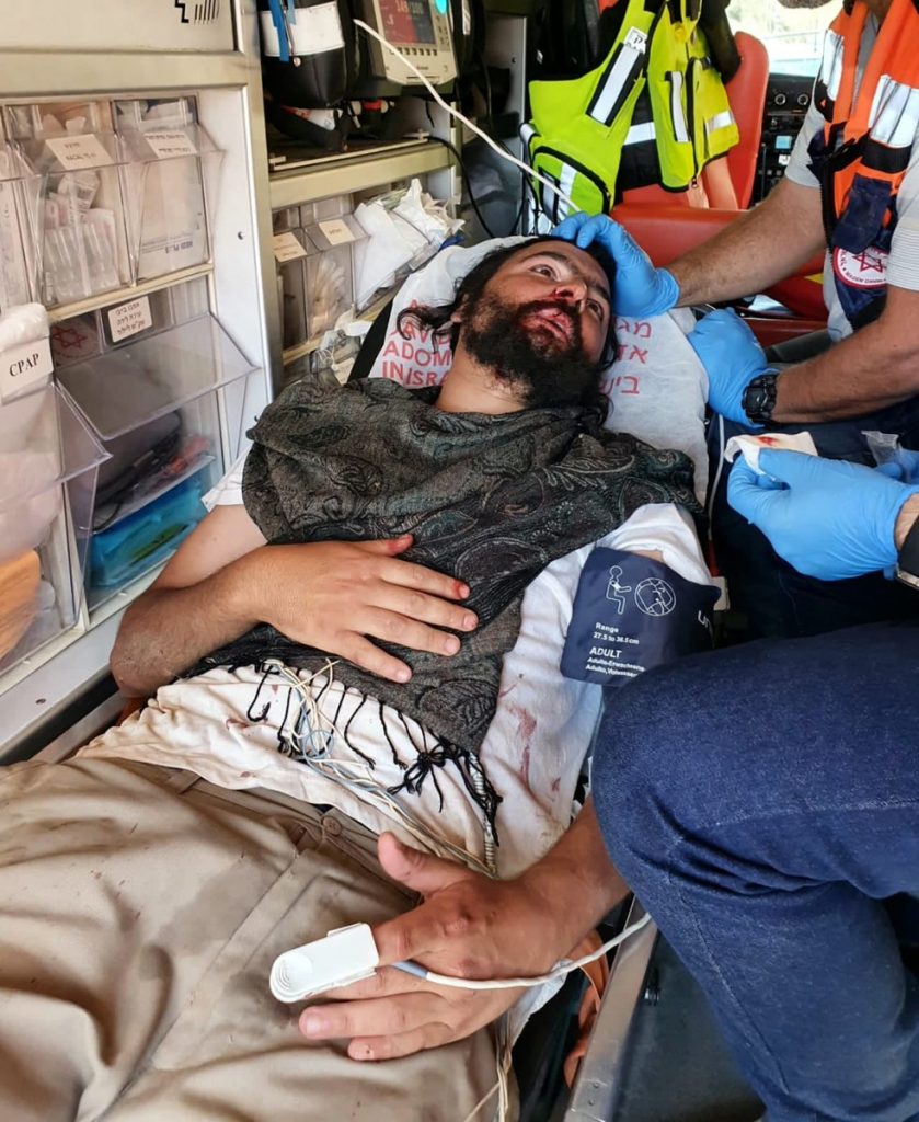 A Jewish community member being treated by MADA after being beaten beside the Jewish community of Ali Zahav.