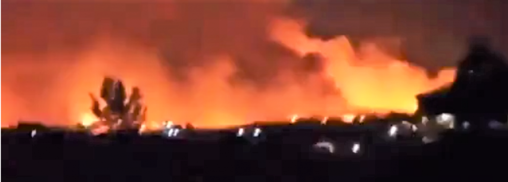 A screen shot from a video taken by a Syrian observer. The explosions are still rocking the area this morning.