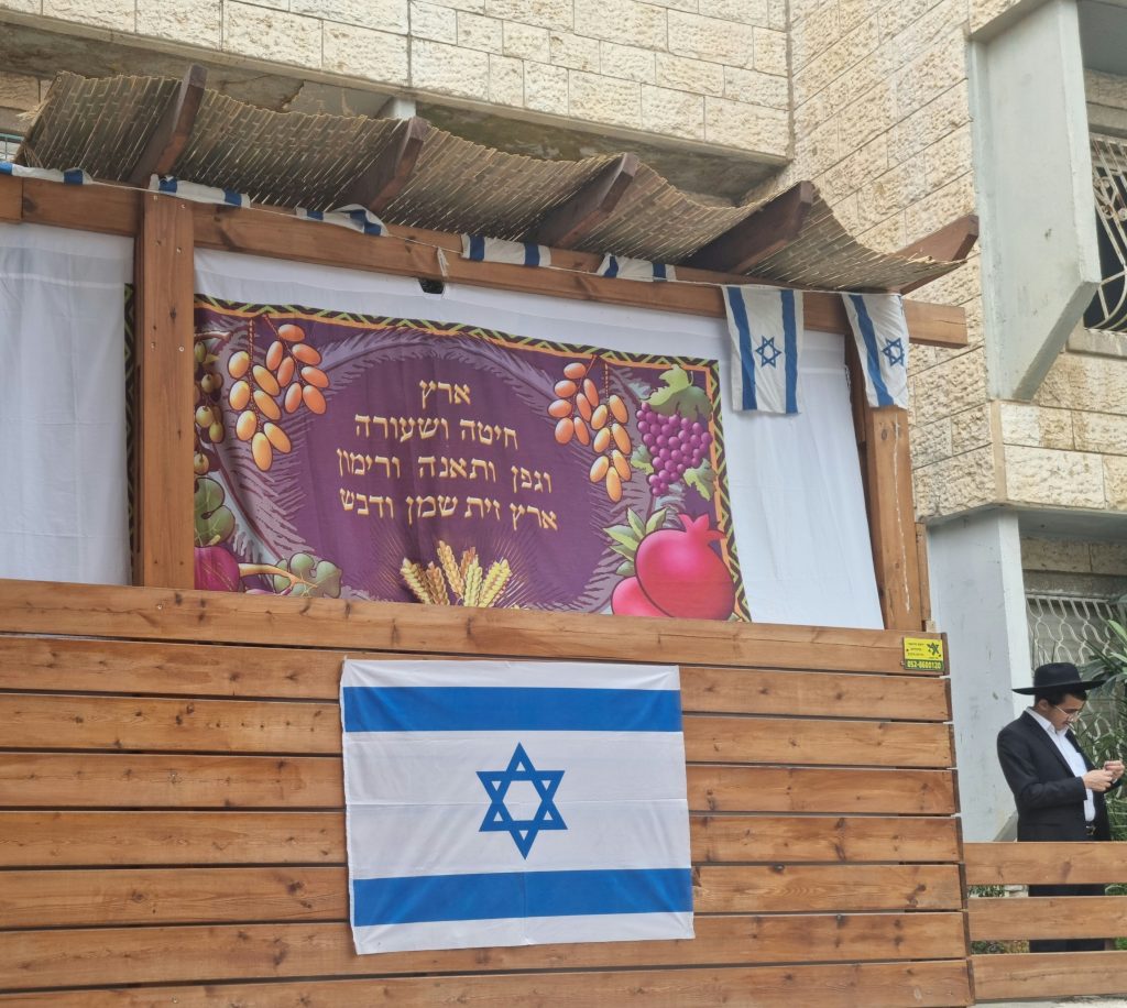 As I was walking through the orthodox neighborhood of Ramot in Jerusalem yesterday, I was struck by this sukka.