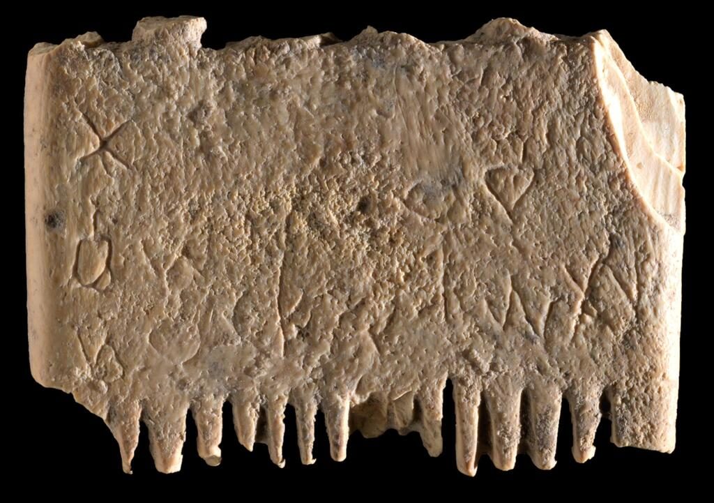 An Canaanite ivory comb unearthed at an archaeological site at Lachlish dated to about 1700 BCE. What do you think is written on it? 