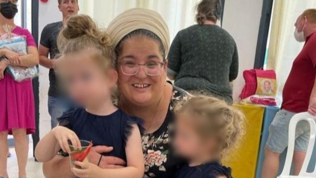 Batsheva Negri with some of her kindergarten children.