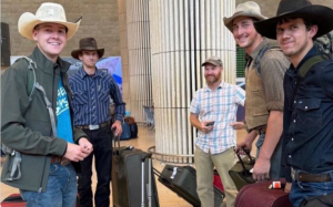 Cowboys and farmer from Montana and Arkansas arriving at Ben Gurion yesterday. They have come to help farmers in the South.