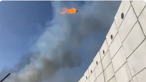 The IDF is using the catapult to launch fireballs over the fence.